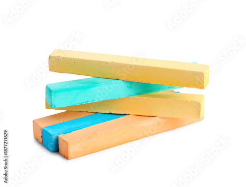 Colorful chalks on white ba...