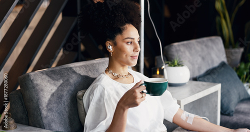 Fotografie Woman, iv infusion and tea in drip lounge, healthcare and music for medical treatment and streaming