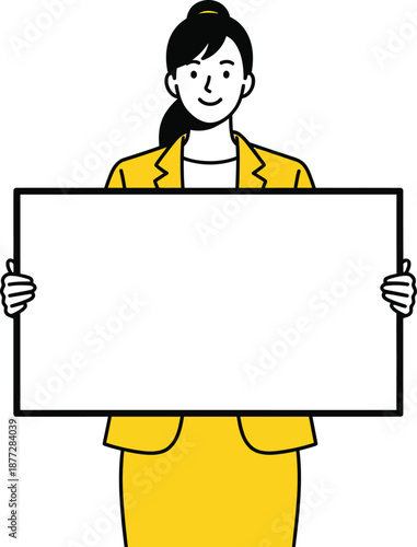 Professional businesswoman in a yellow suit with a hair bun smiling while holding a blank white board.