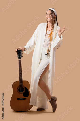 Young happy female hippie w...