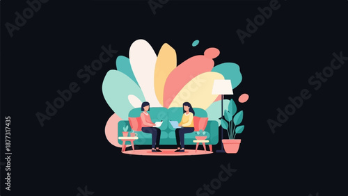 Two women converse on a couch, with plants and a lamp in a modern room