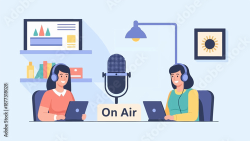 Two women in headphones podcasting live with microphones and laptops in studio