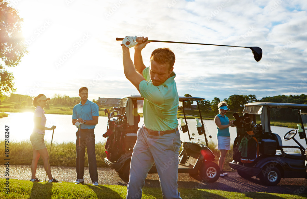 Obraz premium Sports, swing and man on course with golf challenge, tournament or game in nature at club. Lens flare, cart and male person with group of people for putter outdoor with hobby, training or skill.