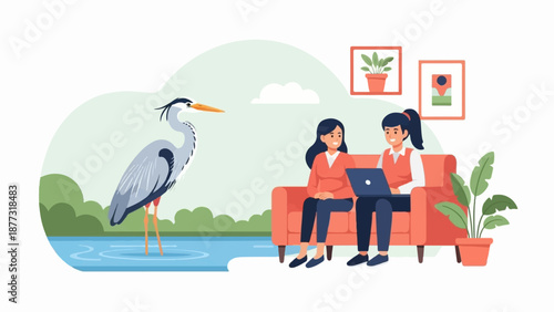 Two women on a couch with a laptop, a heron by the water and plants on the wall