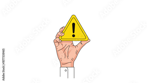 Human hand holds a yellow triangular warning sign with a black exclamation mark to indicate danger or important attention required.