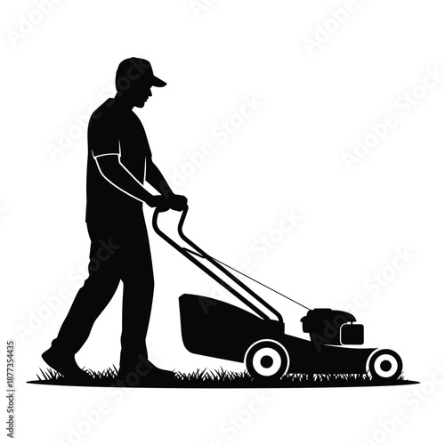 man pushing a lawn mower in the grass