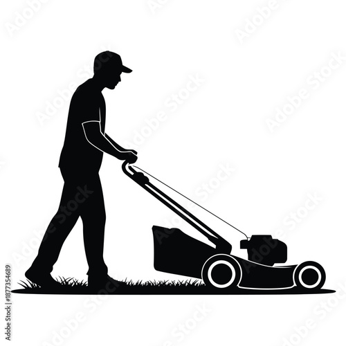 man pushing lawn mower on grassy area