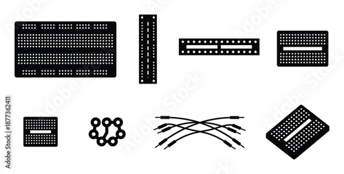Black and white breadboard components, circuits, cables, PCB design elements for electronics projects and designs.