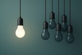 Illuminating Insights: A bright lightbulb glows brightly, casting an ethereal luminescence against a backdrop of subdued darkness. This evokes the spark of innovative thinking.
