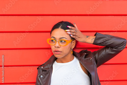 Wallpaper Mural portrait of modern urban woman with glasses and red background Torontodigital.ca