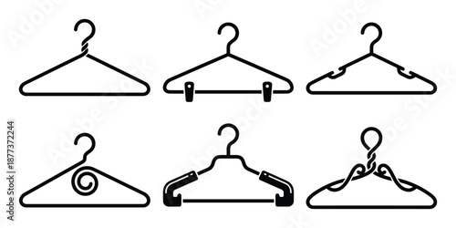 Six coat hangers in various designs. Stylish clothes storage, garment organization tools, wardrobe design.