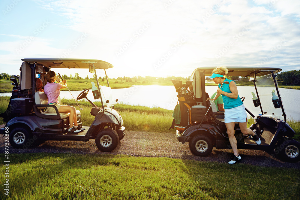 Fototapeta premium Golf cart, people and women with hobby, game and drive for weekend with bonding together. Friends, girls and buggy with group for transport, golfing course or sport for fitness and outdoor with flare