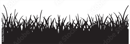 vibrant green grass elements in a field that stand alone