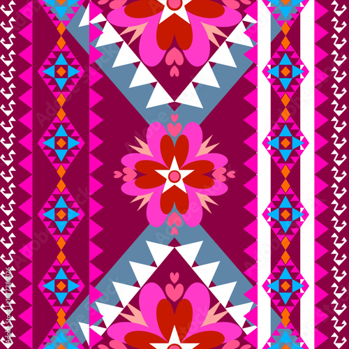 A vibrant seamless geometric pattern featuring ethnic tribal motifs and floral ornaments. The design showcases a modern bohemian style with symmetrical diamond shapes and zigzag lines in turquoise, br