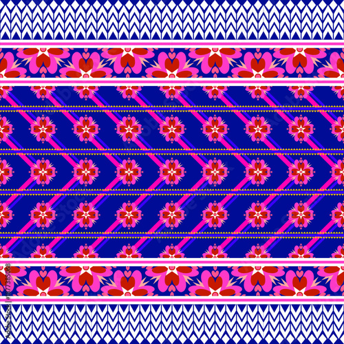 A vibrant seamless geometric pattern featuring ethnic tribal motifs and floral ornaments. The design showcases a modern bohemian style with symmetrical diamond shapes and zigzag lines in turquoise, br