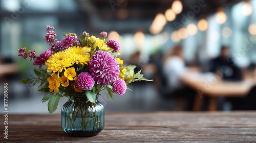A desk in the office, filled with flowers and gifts, surrounded by smiling coworkers on March 8 and Valentine's Day