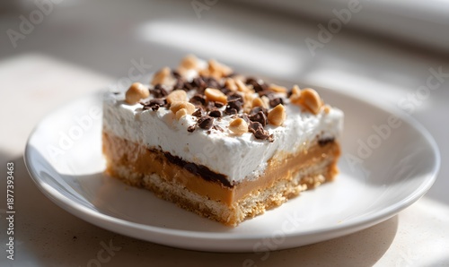 Wallpaper Mural A square slice of layered dessert on a simple white plate sitting on a kitchen counter Torontodigital.ca