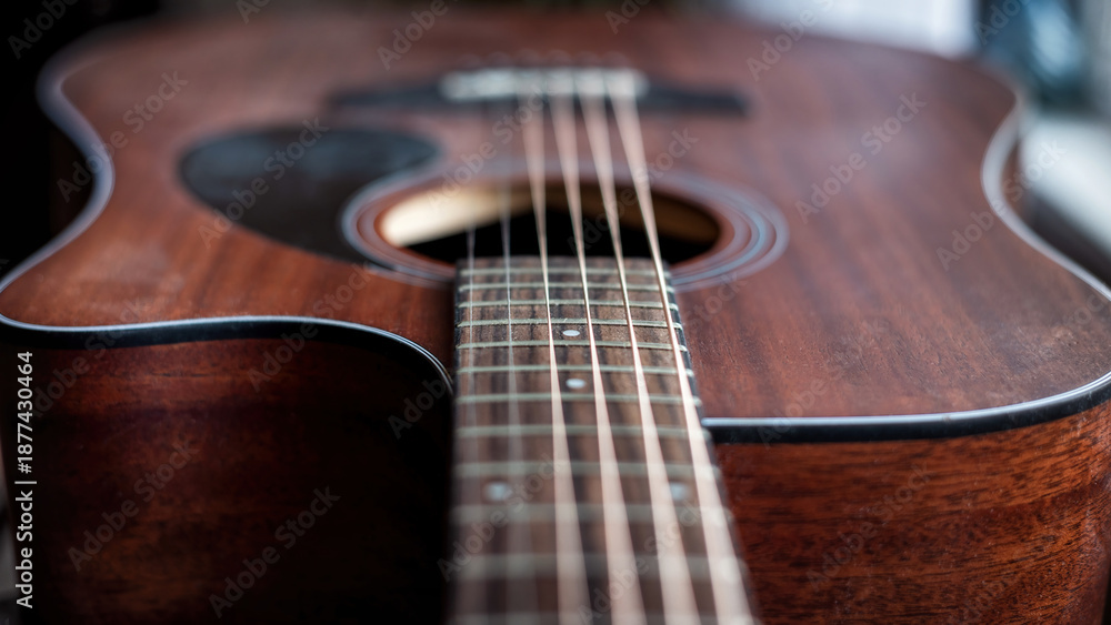 Fototapeta premium Strings and neck of an acoustic guitar.