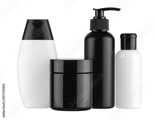 A set of empty black plastic bottles for cosmetics and spray bottles for shampoo or lotion are placed separately on a white background