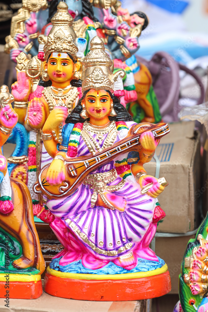 Fototapeta premium Hindu goddess Saraswathi dolls displayed for sale in a shop for the golu festival