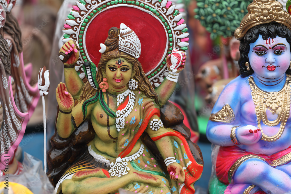 Fototapeta premium Arthanareeswarar dolls in shop for golu festival