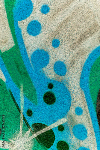 beautiful wallpaper of street wall graffiti painting of aerosol urban art. Colorful city background of spray graffiti drawing in modern culture style