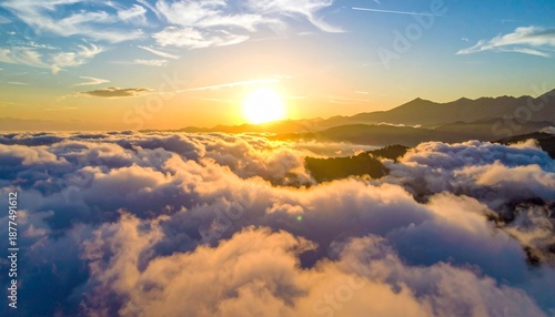 Golden Sunrise Above a Sea of Clouds - A Breathtaking Aerial View.