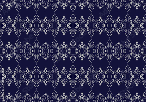 The exquisite seamless pattern is distinguished by silver embellishments on a dark blue background.