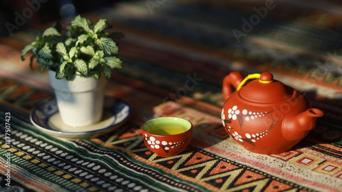 Valokuva The teapot and teacups were already filled.