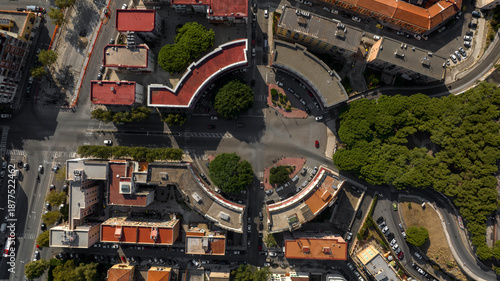 Slika na platnu Top-down aerial view of a symmetrical urban plaza
