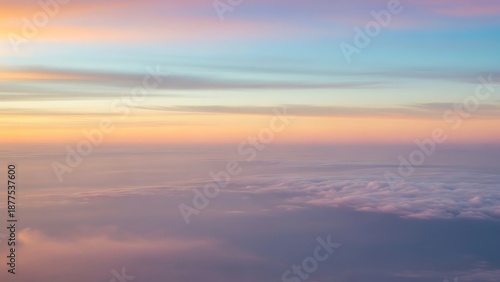 Serene sunset above clouds with vibrant sky colors