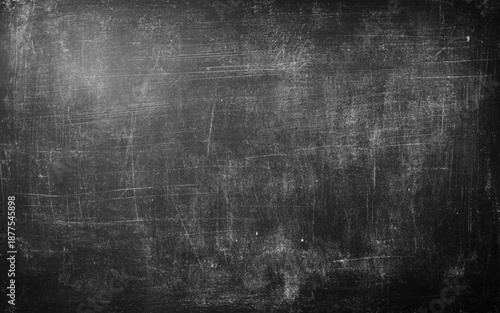 Chalk rubbed out on blackboard background. 