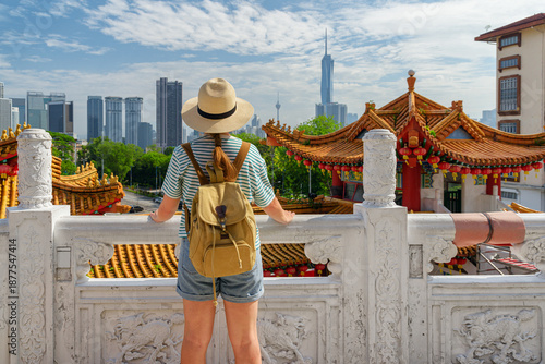 Photography Female tourist is enjoying view of Kuala Lumpur, Malaysia
