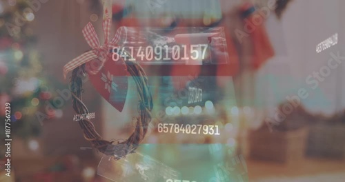 Animation of data processing on screens over christmas decoration