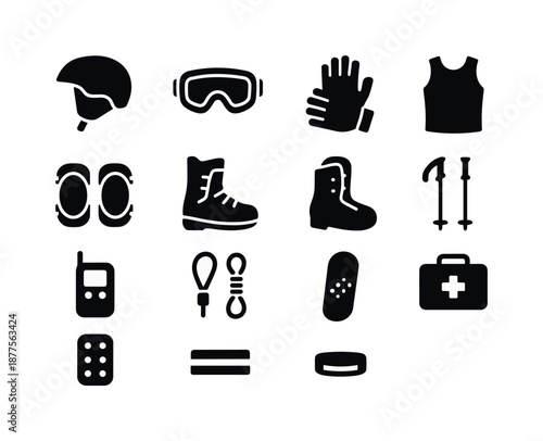 Winter Sports Safety Icons. Winter sports safety. Solid icon set of winter sports safety: ski helmet, goggles, gloves, knee pads, snowboard boots, thermal