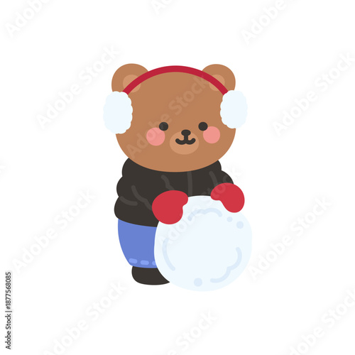 A cute bear shaping a big snowball outdoors