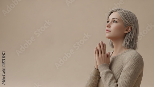 Woman Praying hopefully gazing upward in soft light