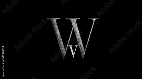 Elegant dark W and V monogram with grunge texture on black background. Stylized vintage metallic letter design element.