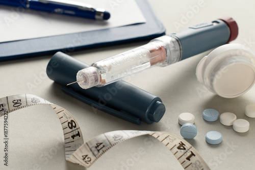 Diabetes Management with Insulin Pen, Medication, and Measuring Tape