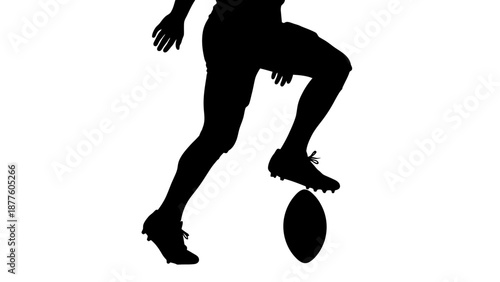 American Football Player Kicking the Ball.