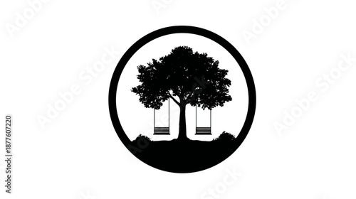 A silhouette of a tree with swings inside a circle, set on a dark grassy hill
