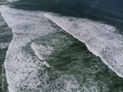 Aerial view of powerful ocean waves crashing along the Sri Lankan coastline near Bandaramulla