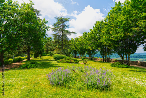 Colourful flowers in park Domme Historic Town, Nouvelle-Aquitaine Dordogne Valley, France