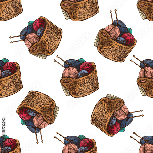 Hand drawn vintage seamless pattern of wicker basket with yarn balls and knitting needles illustration