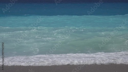 Greece Beach with Blue Waves Crashes on Seashore, Seascape View with Turquoise Water in Summer Vacation