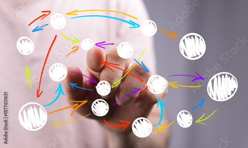 A human hand interacts with...