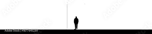 Silhouette of a lone male against a minimalist urban backdrop