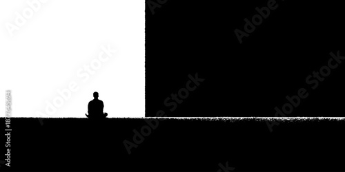 Silhouette of person meditating in minimalist black and white landscape