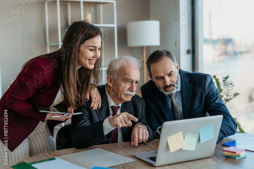 Multi-Generational Business Team Smiling Together in Modern Office – Family Business Atmosphere