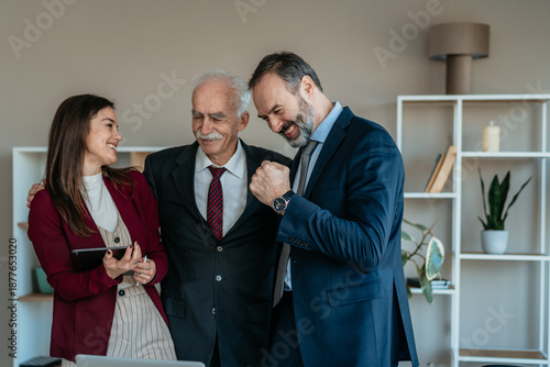 фотографія Senior Businessman with Son and Daughter in Modern Office – Family Business Tran